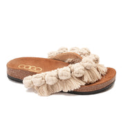 Beige Flip-flops featuring circles