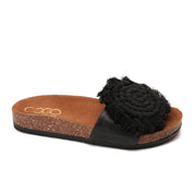 Black slipper handmade with a flower-shaped design